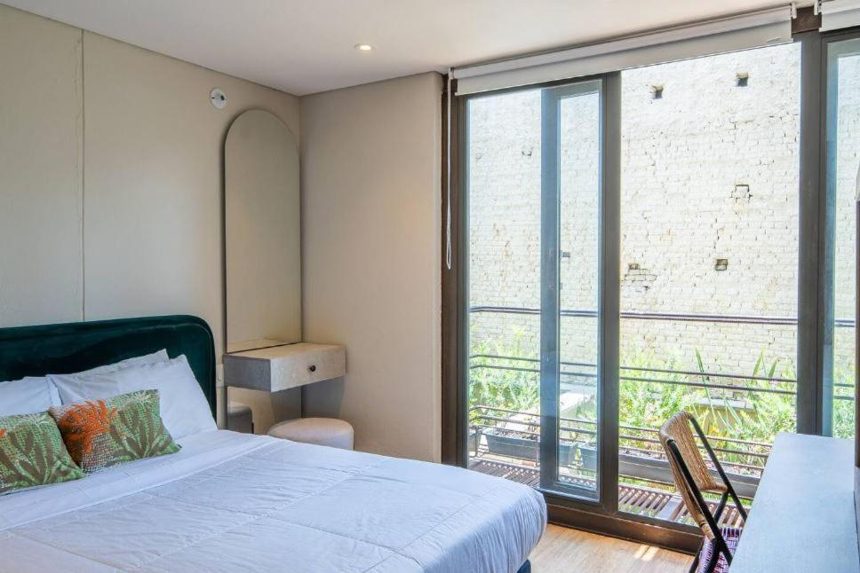 Morph Candelaria - Gestion Hotelera ボゴタ エクステリア 写真